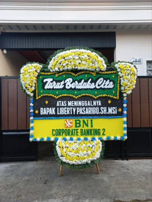 Papan Bunga Duka di Bina