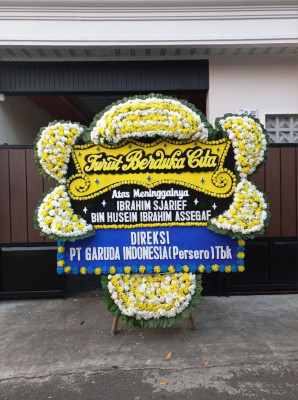 Papan Bunga Duka di Bina