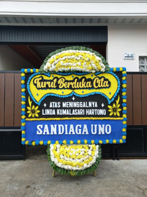 Papan Bunga Duka di Bina